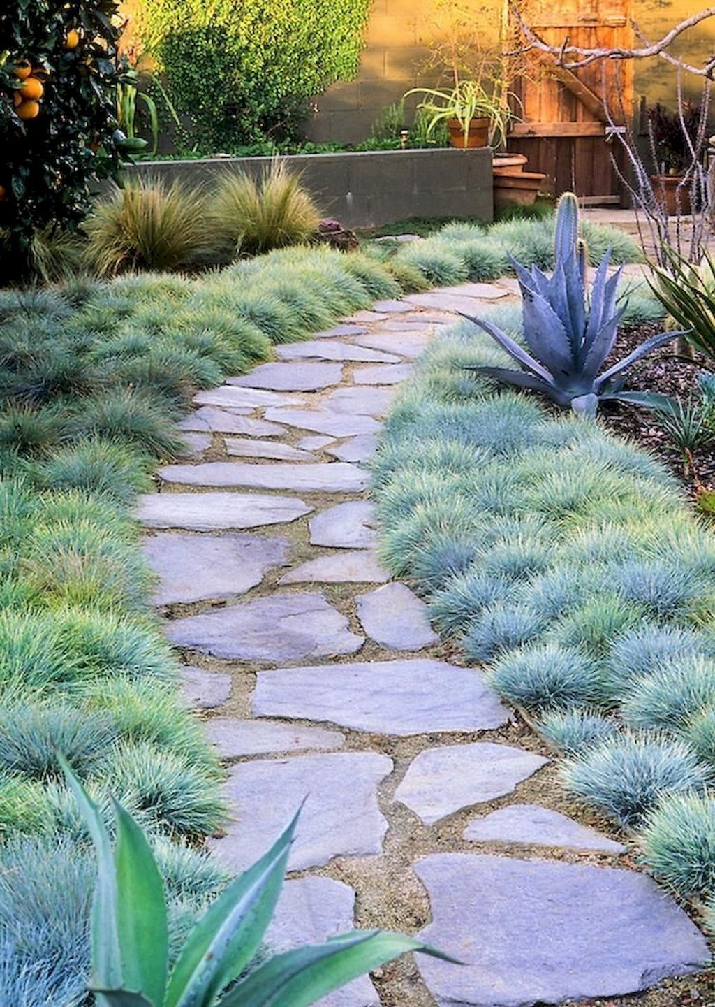 Newest Stepping Stone Pathway Ideas For Your Garden 27