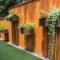 Beautiful Garden Fence Decorating Ideas To Follow 34